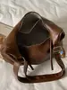 Bolsa Tote Elegante e Moderna Shuai Mijia 2026 Nova Bolsa Casual Retrô de Grande Capacidade Bolsa Transversal de Ombro Único com Personalidade Feminina