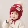 Chapéu de bebê para outono e inverno, quente e à prova de frio, chapéu de lã tricotado com proteção para as orelhas, chapéu infantil, chapéu de tricô com pompom para meninos e meninas