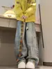 Jeans masculino de corte reto, solto e perna larga, com bordado de toalha de desenho animado, estilo high street americano, marca da moda com design cool e estiloso
