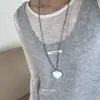 Versão Coreana da Corrente Longa para Suéter Dongdaemun Reina com Pingente de Coração de Design de Nicho, Estilo Único e Exagerado, para Mulheres
