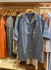 Tela de Alta Calidad Día Individual Verano Ropa para Hombre Mujer Mezcla de Algodón Modal Camisa de Cuello Abierto Camisa de Manga Corta 464938