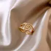 Anillo elegante con microincrustaciones de circonitas en forma de cruz, chapado en oro auténtico, estilo coreano, ideal para el dedo índice de las novias.