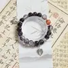 Pulseiras Populares de Novo Estilo Chinês Peace Lock Empilhadas com Contas com Design de Nicho de Borboleta em Estilo Antigo Pulseiras de Barraca de Mercado Noturno