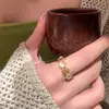 Anillo de Moneda de Cinco Emperadores Hueco Dorado para Mujer, Estilo Nuevo, Lujo Ligero, Sensación de Alta Gama, Anillo para Dedo Índice, Diseño de Nicho, Apertura Ajustable