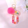 Llavero de letras con pompón rosa y gota de pegamento A-Z26 colgante de nombre de letra colgante de bolsa venta caliente transfronteriza