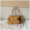 Bolso de mano de gran capacidad transfronterizo para mujer, nuevo y moderno 2026, superficie suave, textura de tachuelas, para hombro y cruzado