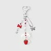 Llavero Colgante para Bolso de Alta Calidad con Temática Roja Dulce y Exquisita: Fresa, Mariposa, Corazón, Luna, Estrella, Lazo