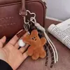 Colgante Oso Frijol Estilo Miu Colgante de Bolso con Cuerda para la Mano Peluche de Béisbol Lindo Llavero de Peluche de Dibujos Animados