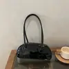 Color sólido transfronterizo casual gran capacidad PU principios de otoño simple nuevo diseño 2026 bandolera debajo del brazo bolsa de boliche
