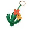Encantos creativos de cuero con temática de planta de cactus de gran venta, accesorios para bolsos y ropa, y llaveros - al por mayor