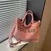 Bolso de mujer de color liso, gran capacidad, pana, nuevo diseño 2026, estampado de letras elegante, bolso de mano, bolso de hombro