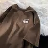 Camiseta Blanca de Manga Corta para Hombre 100% Algodón Nuevo Estilo 2026 Verano Estilo Hong Kong Holgada Cuello Redondo Manga Corta Ropa para Hombre