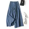 En stock al por mayorPantalones culotte anchos de algodón y lino para mujer con caída holgada, cintura alta semi-elástica, efecto adelgazante, largo de nueve puntos, para exportación