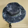 Sombrero de pescador de borde redondo de material de tarjeta de poliéster al por mayor sombrero de pescador para exteriores para hombres y mujeres sombrero para el sol puede ser al por mayor en stock