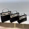 Bolso Kelly para Mujer 2025 Nuevo Bolso Cruzado Mini Bolso Pequeño Bolso con Patrón de Cocodrilo Bolso de Mano Mini Versátil de Alta Gama