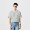 Camiseta casual de alta gama estilo americano con textura a cuadros de manga corta para hombre, nuevo estilo Primavera y Verano 2026, top holgado y cómodo para hombre