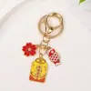 Nuevo Llavero de Aleación de Placa Yushou Japonesa con Carpa y Flor de Cerezo Colgante de Mochila Escolar para Parejas Afortunadas Colgante