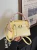 Bolso de Mano de Estilo Sencillo y Relajado 2026 Primavera Nuevo Bolso Cruzado de Moda y Único Bolso de Hombro para Viajes de Oficina para Trabajadores