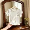 Camiseta de manga corta de estilo coreano para niña con volantes y dibujos animados, top infantil de verano acanalado elástico transfronterizo, disponible en varios colores y en stock