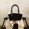 Bolso de axila retro de alta costura para mujer, nuevo modelo de invierno 2026, bolso de mano casual de gran capacidad, bolso tipo cubo, bolso de hombro