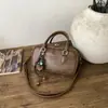 Bolso Retro Simple y Versátil para Mujer 2025 Invierno Nuevo Estilo Lujo Accesible Bolso de Hombro Cruzado Tipo Bowling de Gama Alta