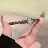 2026 Nuevo Pasador de Flor de Cristal Negro Estilo Coreano para Frente y Flequillo Lateral, Elegante Pinza de Pato