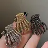 Pinza de Garra de Calavera Gótica para Halloween Estilo Oscuro Plegado Pinza de Cabello de Aleación Parte Posterior de la Cabeza Recogido Pinza de Tiburón Cola de Caballo Accesorios para el Cabello