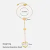 Pulsera de Perlas Mariposa de Gama Alta de Nicho Europeo y Americano con Cadena de Muñeca Integrada de Acero Inoxidable Chapado en Oro de 18K con Trébol de Cuatro Hojas