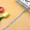 Nuevo estilo nacional encaje bordado cinta tejida accesorios para ropa zapatos y sombreros accesorios para equipaje 1CM de ancho ventas directas de fábrica