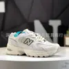 Putian Pura Original NB530 Venta al por mayor Retro Blanco Plateado Zapatos Torre para Mujer Deportes al Aire Libre Ocio Correr Versátil Zapatos de Pareja