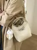 Bolso Cubo Retro de Mano Estilo Coreano de Nicho para Mujer 2026 Invierno Nuevo Elegante Casual Versátil Bolso de Hombro Cruzado