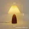 Lámpara de mesa de cerámica retro nórdica, lámpara de mesita de noche de dormitorio plisada, luz nocturna decorativa de ambiente de imitación de veta de madera de alta gama