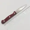 Faca de Frutas de Grão de Madeira Imitada Três Pregos Cortador de Frutas Doméstico Mercadorias Pequenas Atacado 2 Yuan