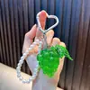 Llavero de uva translúcida con cuentas, un colgante de bolso fresco y frutal, un accesorio de cadena para teléfono versátil para mujer, regalo al por mayor