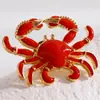 Broche de aleación estilo vacacional transfronterizo europeo y americano en la playa y el océano, personalizado con goteo de aceite de langosta y cangrejo rojos