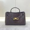 Diseño nicho primavera nuevo metal hebilla de cuerda cuero tejido bolso tote hombro portátil gran capacidad retro bolso de mujer