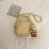 Bolsa de Almofada Portátil Doce Estilo Coreano Feminina 2026 Verão Nova Tendência Bolsa Transversal Quadrada Pequena Chique para o Trabalho