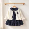 Nuevo cárdigan de punto dulce de otoño con cuello de muñeca, vestido de manga larga de lunares, conjunto de dos piezas para niñas