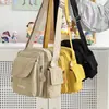 Bolsa para cámara popular transfronteriza con múltiples bolsillos, bolsa ligera de nailon resistente al agua, bandolera y cruzada casual unisex
