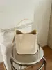 Bolsa de ombro tipo saco de tecido grande capacidade com design exclusivo para mulheres, nova moda primavera 2026, bolsa de ombro versátil