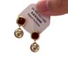 Aretes de Perla Marrón Champán Francés 2024 Otoño e Invierno Nuevo Simple Elegante Combinable de Alta Gama Aretes de Fragancia