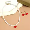 Joyería transfronteriza de San Valentín más vendida Aretes de flor de rosa roja Collar de corazón Conjunto Aretes de San Valentín europeos y americanos