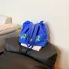 Bolsa de Lona Estilo Coreano 2026 con Letras e Impresión Ins, Bolso de Hombro para Viajes Diarios con Cordón, Gran Capacidad, en Color Beige y Café