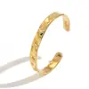 Pulseira Transfronteiriça de Aço Inoxidável Europeia e Americana para Mulheres, Olho de Diabo Flor de Bambu Design Geométrico Personalizado Pulseira Aberta