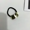 Elástico para Cabelo Novo Elegante Geométrico de Metal Côncavo e Convexo Estilo Frio Transfronteiriço Europeu e Americano Corda de Cabelo Faixa de Cabelo Cento Torres Retro para Mulheres