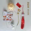 Linterna luminosa de personaje feliz estilo antiguo tejida a mano de bambú linterna de flores de mano linterna pequeña paquete de material DIY colgante venta al por mayor