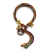 Cuerda de mano de Xizang bermellón thangka ocho santos protectores puxian guanyin thangka pulsera tejida a mano cuerda de mano de la reencarnación