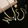 Conjunto de Anillo, Pendientes, Collar y Pulsera de Zirconia en Forma de Gota Transfronterizo, Cadena de Garra Doble Capa Súper Brillante de Moda para Clavícula para Mujeres