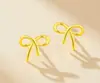 Pendientes de Lazo 999 Oro Puro y Plata Jiufengxiang para Mujer, Pendientes de Alta Gama Modernos y Exquisitos, un Regalo Navideño para tu Novia