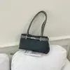 Bolso de lona de alta gama de nicho 2026 nuevo estilo moderno versátil bolso de hombro único de lona bolso tote de hombro único bolsa para ir al trabajo